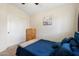 Bedroom featuring neutral walls, plush carpeting, closet and a comfortable bed at 5115 W Kings Ave, Glendale, AZ 85306