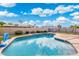 Backyard pool featuring a basketball hoop and view of the fence at 5115 W Kings Ave, Glendale, AZ 85306