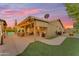 Covered patio features outdoor seating area perfect for entertaining guests at 6126 W Sweetwater Ave, Glendale, AZ 85304