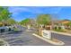 Elegant community entrance with a gated entry, manicured landscaping, and a welcoming sign for Claremont Estates at 722 W Claremont St, Phoenix, AZ 85013
