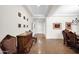 Foyer with tiled flooring, an art display and access to other rooms at 722 W Claremont St, Phoenix, AZ 85013