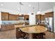 Kitchen with custom cabinets, a large island and stainless steel appliances at 722 W Claremont St, Phoenix, AZ 85013
