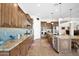 Beautiful kitchen featuring stainless steel appliances, ample cabinet space, and tile flooring at 722 W Claremont St, Phoenix, AZ 85013