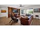 Spacious living room featuring custom built-ins and natural light at 722 W Claremont St, Phoenix, AZ 85013