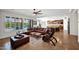 Open-concept living room with large windows and views of the backyard and pool at 722 W Claremont St, Phoenix, AZ 85013