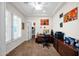 Well-lit home office with neutral colors, spacious layout and natural light creating the perfect remote workspace at 722 W Claremont St, Phoenix, AZ 85013