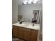 Well-maintained bathroom with a spacious vanity, ample storage, and a large mirror for natural lighting at 7318 E Woodsage Ln, Scottsdale, AZ 85258