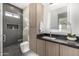 Sleek bathroom features modern fixtures, a glass-enclosed shower, and a contemporary vanity at 7325 E Virginia Ave, Scottsdale, AZ 85257