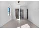 Minimalist bedroom leading into an en-suite bathroom at 7325 E Virginia Ave, Scottsdale, AZ 85257