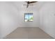 Minimalist bedroom with bright light, natural light, and white walls at 7325 E Virginia Ave, Scottsdale, AZ 85257