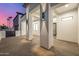 Modern covered entry featuring stylish exterior lighting and access to the front door at 7325 E Virginia Ave, Scottsdale, AZ 85257