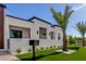 Charming home with manicured lawn, desert landscaping, minimalist accents, and well-maintained curb appeal at 7325 E Virginia Ave, Scottsdale, AZ 85257