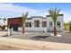 Beautiful desert-landscaped yard in front of a modern home with dark trim and minimalist features at 7325 E Virginia Ave, Scottsdale, AZ 85257
