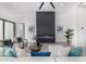 Comfortable and modern living area with sleek fireplace and stylish seating arrangement at 7325 E Virginia Ave, Scottsdale, AZ 85257