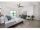 Spacious bedroom boasts natural light, neutral tones, and views of the backyard and pool at 7325 E Virginia Ave, Scottsdale, AZ 85257