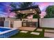 Backyard kitchen area with stainless grill, beverage cooler and covered patio at 7325 E Virginia Ave, Scottsdale, AZ 85257