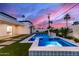 Inviting backyard pool area featuring modern design with a spa, lush greenery, and a serene atmosphere at 7325 E Virginia Ave, Scottsdale, AZ 85257