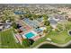 Expansive aerial view showcasing the community amenities including tennis courts, pools, clubhouse, and golf course at 7401 W Arrowhead Clubhouse Dr # 2007, Glendale, AZ 85308