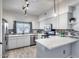 Well-lit kitchen with stainless steel appliances, quartz countertops, and stylish backsplash at 7401 W Arrowhead Clubhouse Dr # 2007, Glendale, AZ 85308