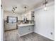Modern kitchen featuring stainless appliances, sleek counter-tops, and stylish lighting, creating a functional and elegant space at 7401 W Arrowhead Clubhouse Dr # 2007, Glendale, AZ 85308