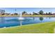 Picturesque pond with a central fountain, enhancing the scenic view at 7401 W Arrowhead Clubhouse Dr # 2007, Glendale, AZ 85308