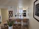 Eat-in kitchen with bar seating, stainless appliances, and seamless flow into living space at 7430 E Chaparral Rd # A243, Scottsdale, AZ 85250