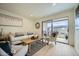 Comfortable living room with a balcony, neutral tones, and lots of natural light at 7430 E Chaparral Rd # A243, Scottsdale, AZ 85250