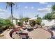 Desert landscaped backyard featuring a stone-paved seating area with comfortable patio furniture at 7705 E Doubletree Ranch Rd # 36, Scottsdale, AZ 85258