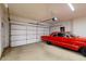 This garage has an updated garage door and plenty of space for vehicles and storage at 7705 E Doubletree Ranch Rd # 36, Scottsdale, AZ 85258