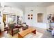 Spacious living room with hardwood floors, high ceilings, and an open layout with access to the dining area at 7705 E Doubletree Ranch Rd # 36, Scottsdale, AZ 85258