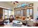Living room with high ceilings, plantation shutters, and comfortable seating at 7705 E Doubletree Ranch Rd # 36, Scottsdale, AZ 85258