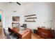 Office space featuring wooden floors, a large desk, and decorative shelving at 7705 E Doubletree Ranch Rd # 36, Scottsdale, AZ 85258