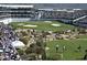 Birds eye view of a PGA golf course with stadium seating for spectators surrounded by natural vegetation at 8262 E Vista De Valle --, Scottsdale, AZ 85255
