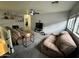 Relaxing living room with carpet floors, cozy couches, and a ceiling fan at 8504 E Lindner Ave, Mesa, AZ 85209