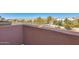 Private balcony shows exterior stucco and neighborhood homes with well-maintained landscaping at 900 S 94Th St # 1204, Chandler, AZ 85224