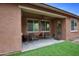 Cozy covered patio with outdoor seating, ideal for relaxing and entertaining guests at 9295 W Wood Dr, Peoria, AZ 85381