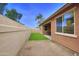 Side yard showing a small area of artificial turf at 9295 W Wood Dr, Peoria, AZ 85381