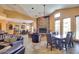 Spacious lounge featuring a stone fireplace, comfortable seating, and large windows at 9451 E Becker Ln # 1041, Scottsdale, AZ 85260