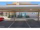 Assigned covered parking spot for residents; landscaped with green bushes along the building at 9451 E Becker Ln # 1041, Scottsdale, AZ 85260