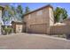 Two-story home with a two-car garage and low maintenance desert landscaping at 10132 E Isleta Ave, Mesa, AZ 85209