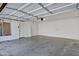 Spacious two-car garage with concrete flooring at 10132 E Isleta Ave, Mesa, AZ 85209
