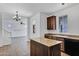 Open concept kitchen area with stainless steel appliances and lots of space at 10132 E Isleta Ave, Mesa, AZ 85209