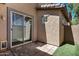 Private patio area with textured concrete and stucco wall at 10132 E Isleta Ave, Mesa, AZ 85209