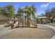 Neighborhood playground area with slides and climbing structures under the open sky, with picnic area nearby at 10132 E Isleta Ave, Mesa, AZ 85209