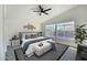 Bedroom with vaulted ceiling, ceiling fan, and natural light at 10160 E Conieson Rd, Scottsdale, AZ 85260