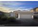 Charming single-story home with a well-manicured front yard and a two-car garage at 10160 E Conieson Rd, Scottsdale, AZ 85260