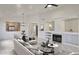 Bright open concept living room with fireplace and lots of natural light at 10160 E Conieson Rd, Scottsdale, AZ 85260