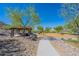 A vibrant community playground offers play structures, picnic areas, and walking paths for recreation at 10251 W Gambit Trl, Peoria, AZ 85383