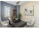 Cozy office area with a stylish desk, ample lighting, and elegant decor at 10251 W Gambit Trl, Peoria, AZ 85383