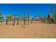 Complex playground with climbing structures, slides, and swings, offering diverse recreational options for  at 10251 W Gambit Trl, Peoria, AZ 85383